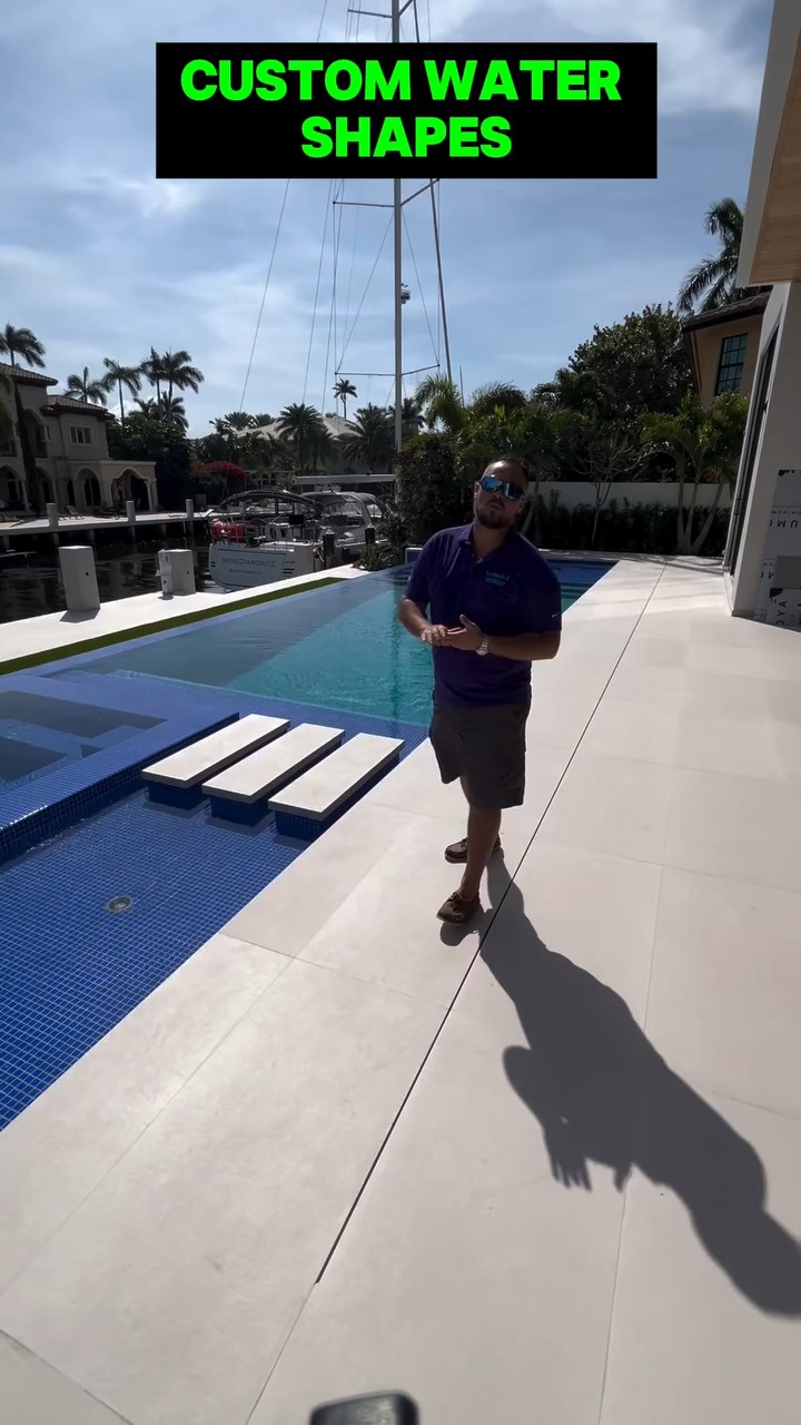 Canal-front infinity-edge pool with yacht dockage in Lighthouse Point, FL