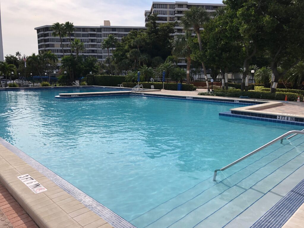 Resurfaced commercial community pool at a Hallandale waterfront condominium